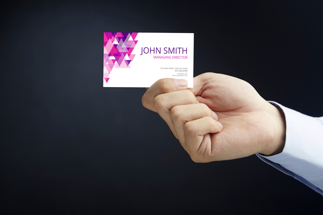 Hand presenting business card concept